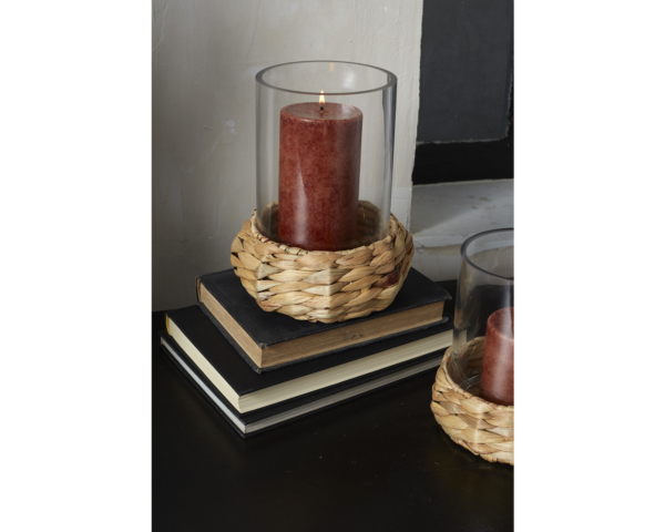 water hyacinth and glass candle holder styled